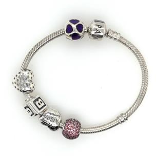 PANDORA STERLING SILVER CHARM BRACELET AND 925 ALE CHARMS